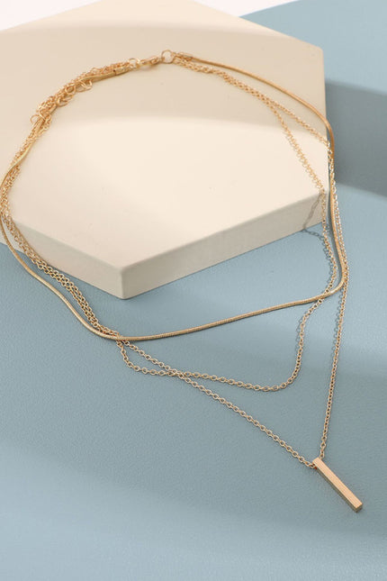 Personalized multi-layered necklace with small vertical pendant clavicle