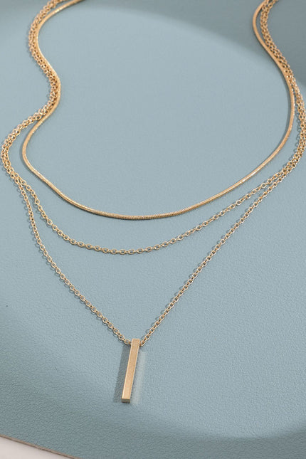 Personalized multi-layered necklace with small vertical pendant clavicle