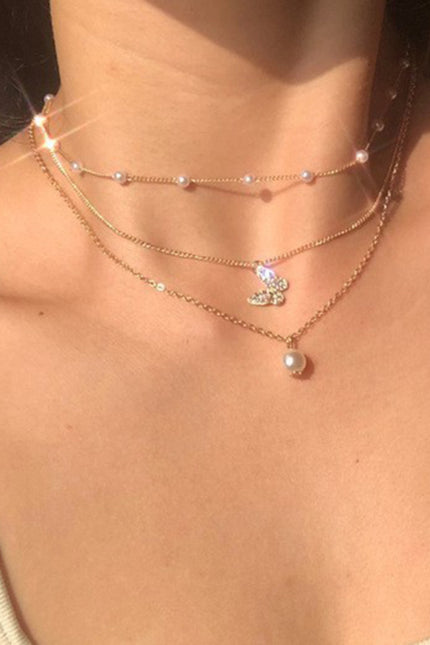 Personalized multi-layered necklace with small vertical pendant clavicle